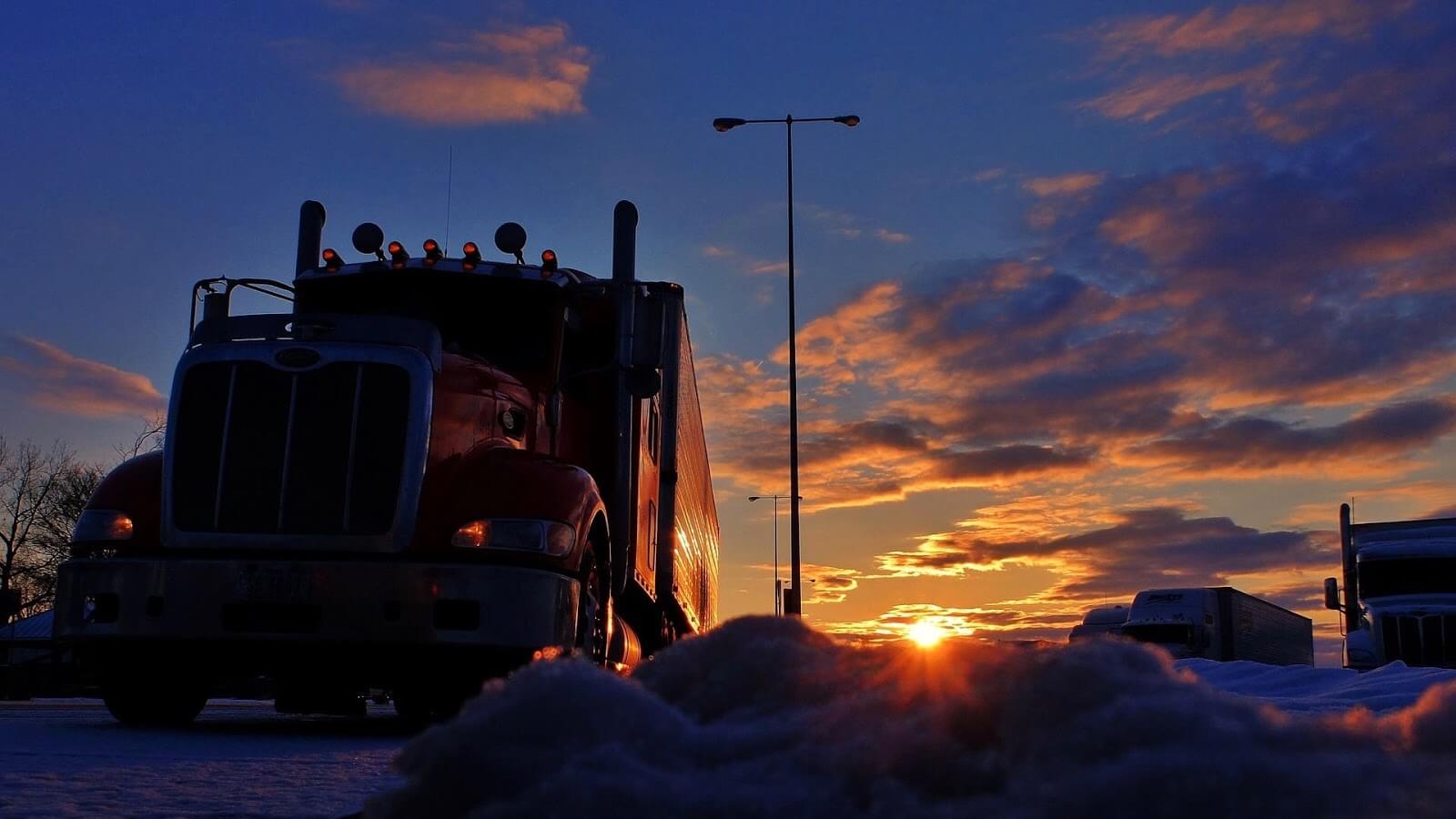 semi-truck at sunset